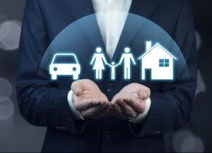 Insurance concept. businessman with car, family